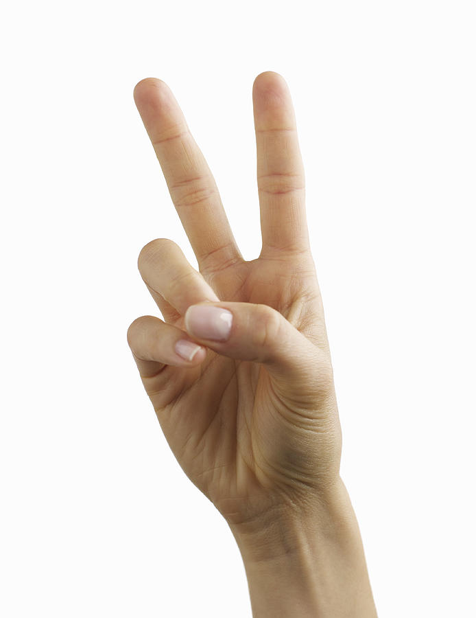 Peace Sign On White Photograph by Ryan McVay