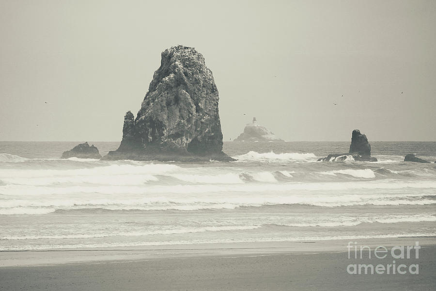 Peaceful Cannon Beach with Lighthouse Sepia Photograph by Carol Groenen