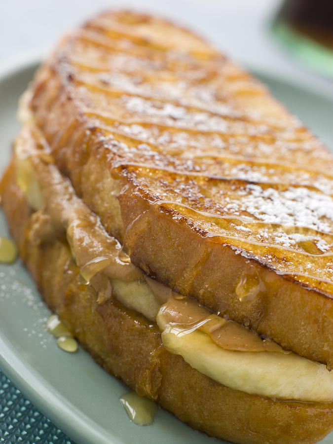 Peanut Butter And Banana Eggy Bread Sandwich With Syrup Photograph by Monkey Business Images