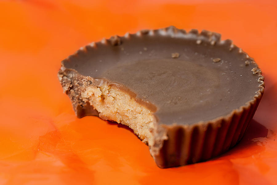 Peanut Butter Cup with Bite Photograph by Perry Gerenday