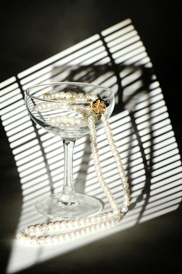 Pearls Necklace in Wineglass Photograph by Dmitry Soloviev