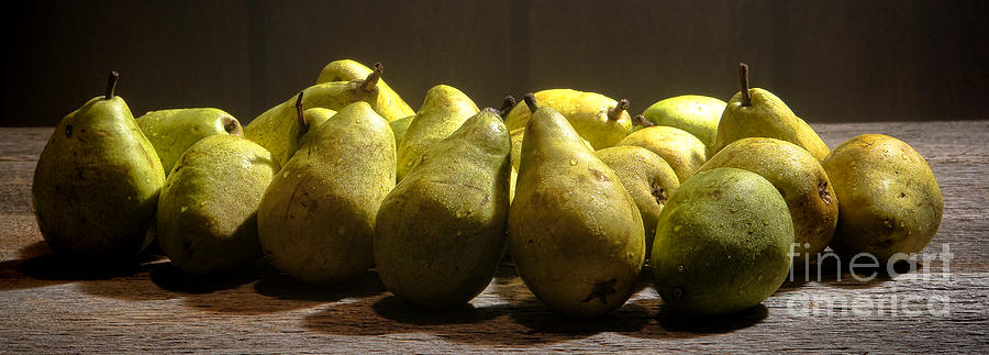 Pear Photograph - Pears on Wood Table by Olivier Le Queinec