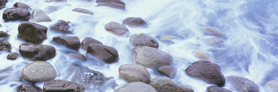 Pebbles on seashore, Las Rocas, Baja California Sur, Mexico Photograph by Panoramic Images