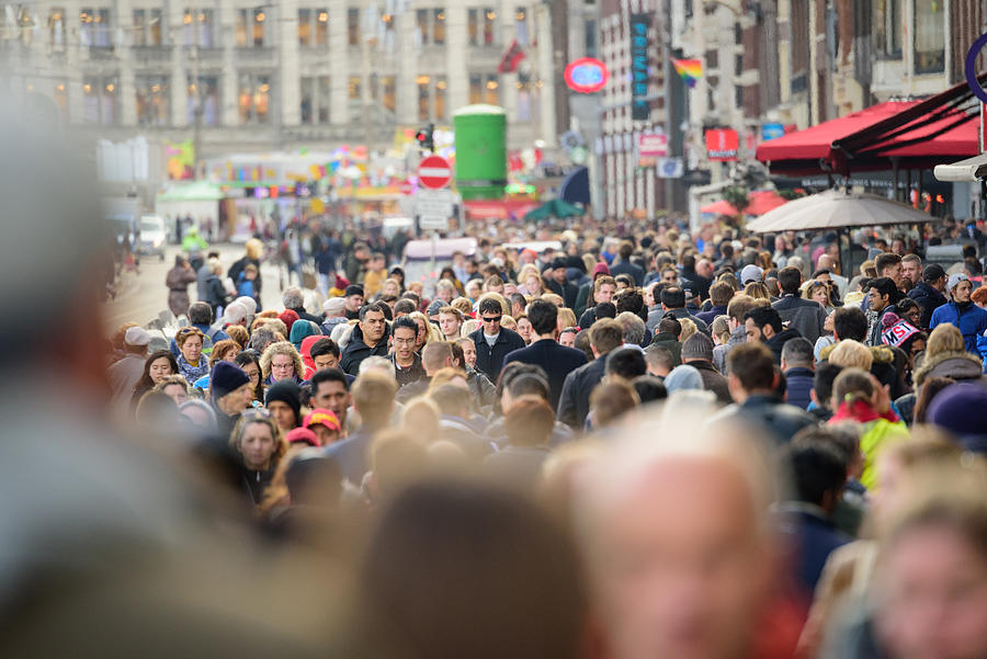 Pedestrians crowd on sidewalk in amsterdam Photograph by Olaser
