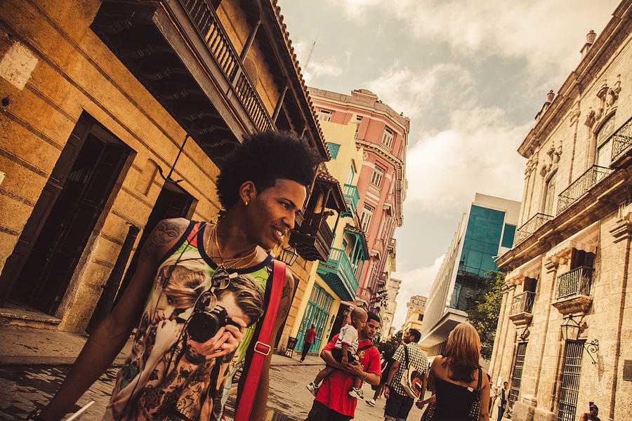 Pedestrians in Calle Obispo, Havana old town Photograph by Anzeletti