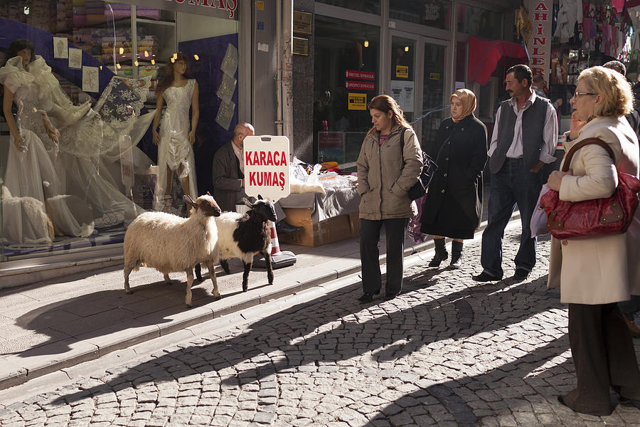 Pedestrians walking past shops in the street in Istanbul, Turkey Photograph by Kelvinjay