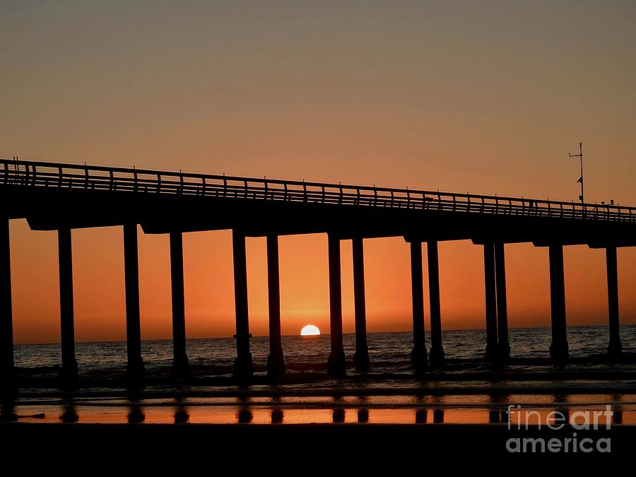 Peeking Pier Sunset - Horizontal Photograph by Beth Myer Photography
