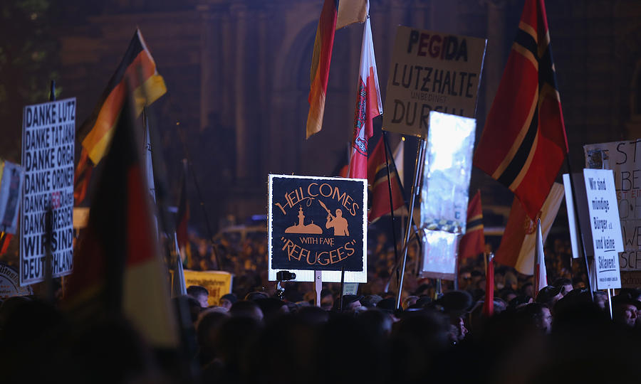 Pegida Movement Marks First Anniversary Photograph by Sean Gallup Pegida Movement Marks First Anniversary Photograph by Sean Gallup