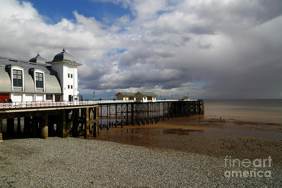 Penarth Pier and stormy skies South Wales Photograph by James Brunker