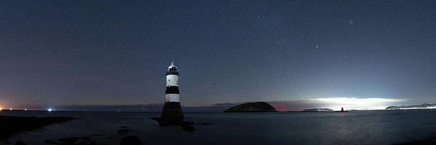 Penmon Lighthouse Anglesey Wales Stars at night Photograph by Sonny Ryse