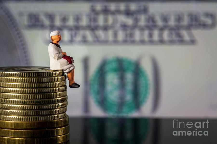 Pensioner sitting on money stack symbol photo for pension, retirement, old age Macro Photograph by Pablo Avanzini