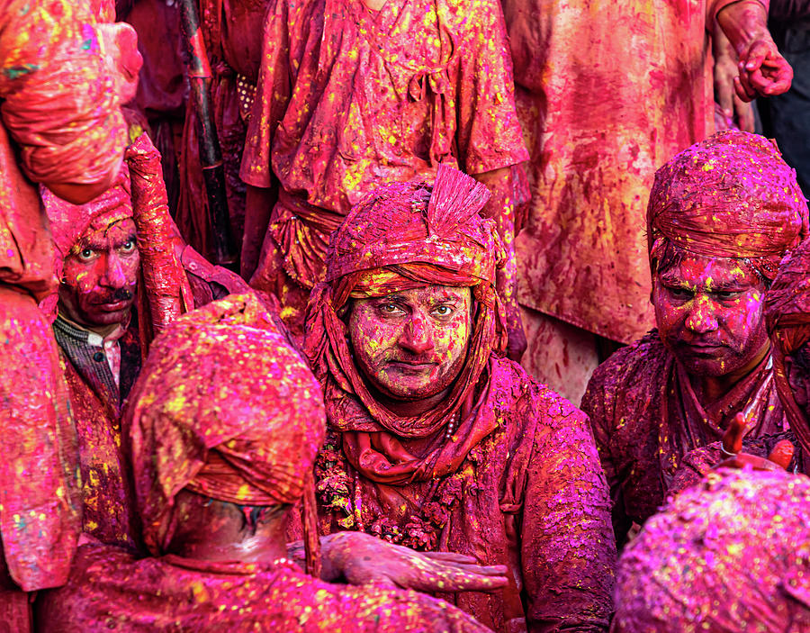 People Celebrating Holi Festival With Colors At A Temple In Barsana
