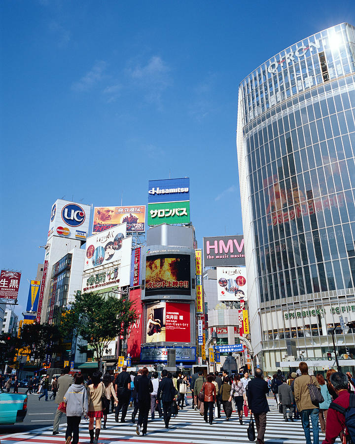 People crossing street in Shibuya, Tokyo, Japan Photograph by Mixa