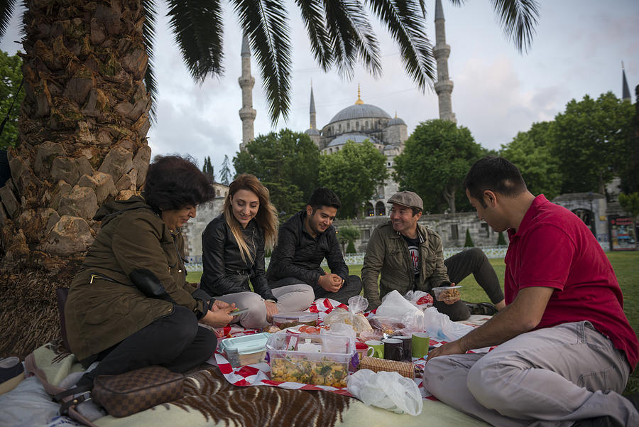 People eating Ramadan iftar meal in Istanbul, Turkey Photograph by Joel Carillet
