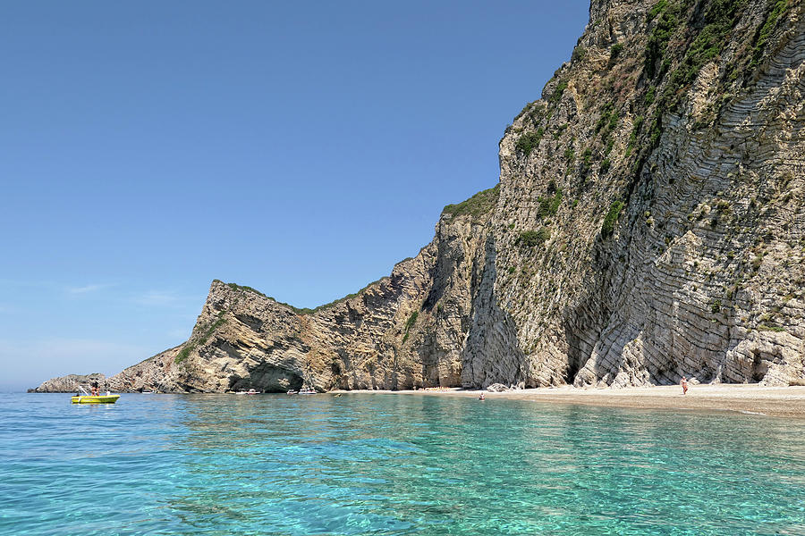 People on the beach of Paradise beach area Corfu, Greece Photograph by ...