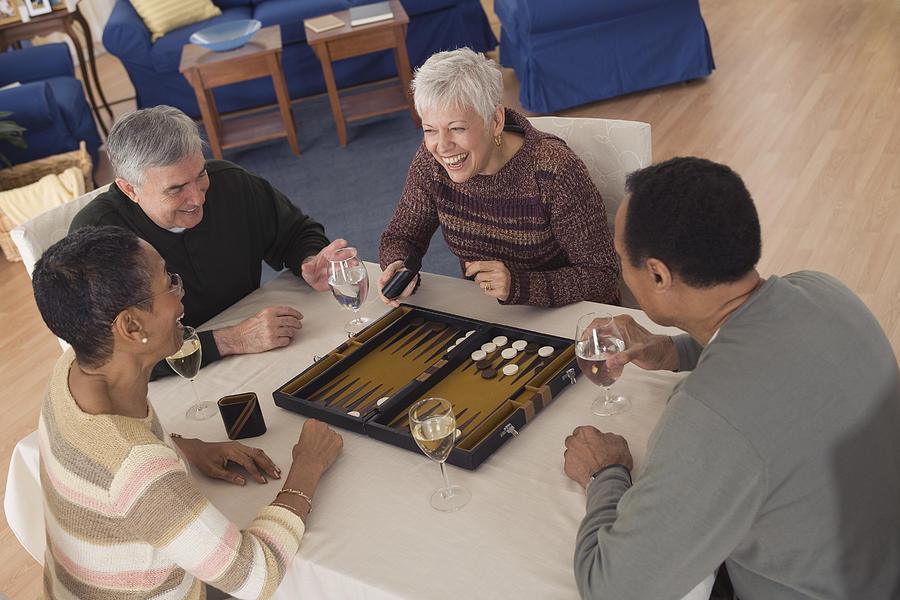 People playing games Photograph by Comstock Images