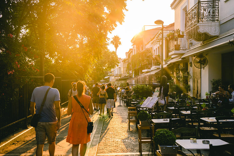 People walking in the streets of Athens in Greece Photograph by Holgs