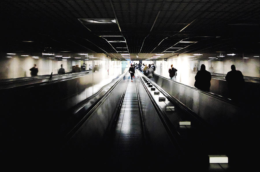 People Walking In Underground Walkway Photograph by Maurizio Siani