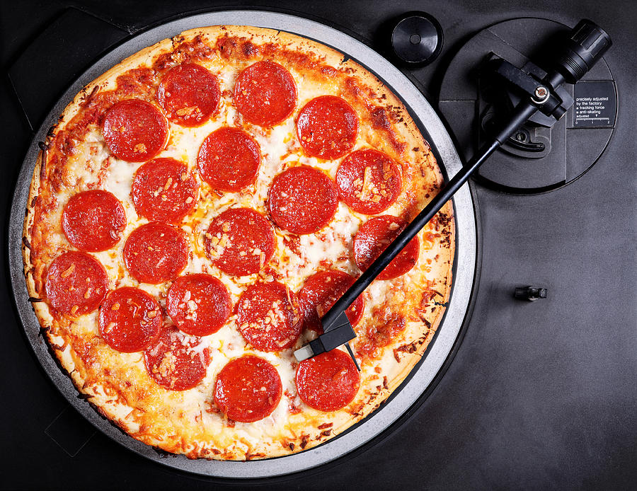 Pepperoni Pizza on Record Player Turntable Photograph by Chang
