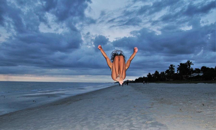 Perfect Backflip Photograph by Donn Ingemie