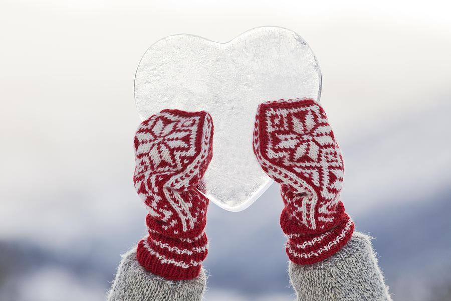Person holding heart shaped ice Photograph by Nord, 62®_ Person holding heart shaped ice Photograph by Nord, 62®_