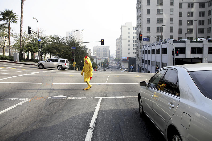 Person in chicken costume crossing the street Photograph by Eric Chuang