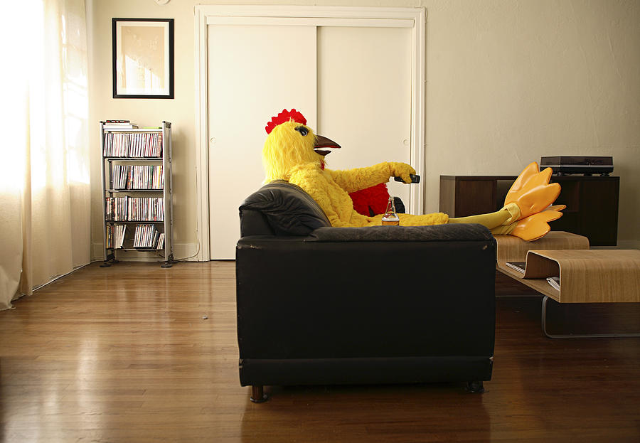 Person in chicken costume relaxing at home Photograph by Eric Chuang