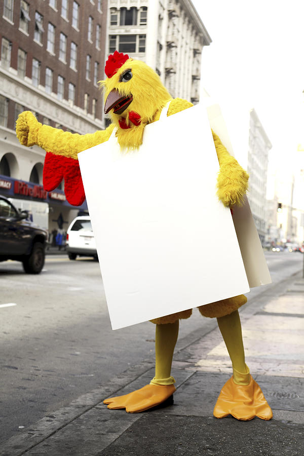 Person in chicken costume standing on sidewalk Photograph by Eric Chuang