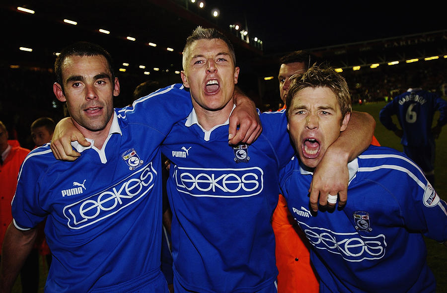Peter Thorne, Graham Kavanagh and Andy Legg of Cardiff City celebrate Photograph by Stu Forster