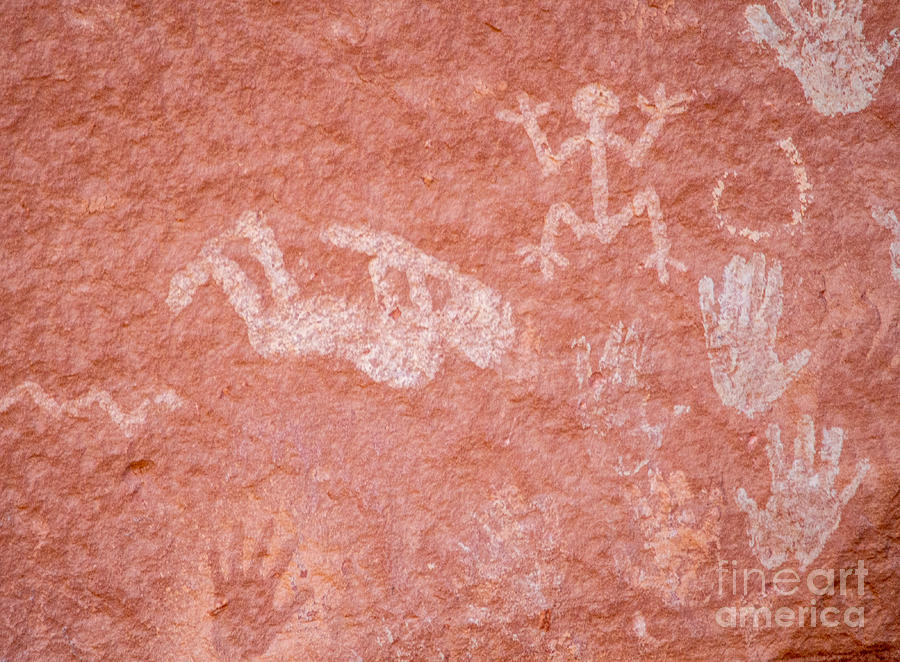 Petroglyphs on a Red Wall in Canyon de Chelly National Monument Photograph by L Bosco