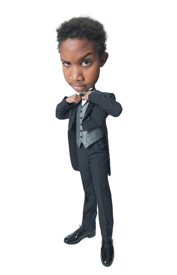Photo Caricature Of A Young African American Boy Dressed In A Tuxedo As He Straightens His Bow Tie Photograph by Photodisc
