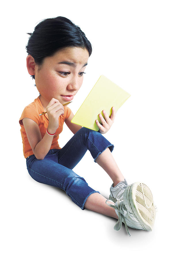 Photo Caricature Of Teenage Asian Girl As She Sits With Her Notebook And Pencil And Attempts To Study Photograph by Photodisc