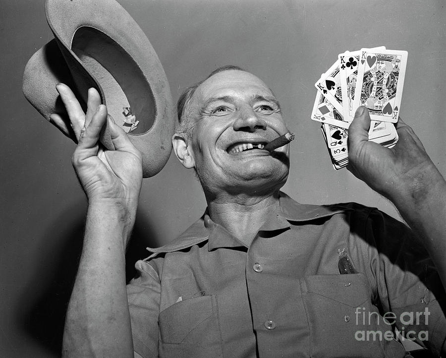 Photo of a man with playing cards 1946 Photograph by The Harrington Collection