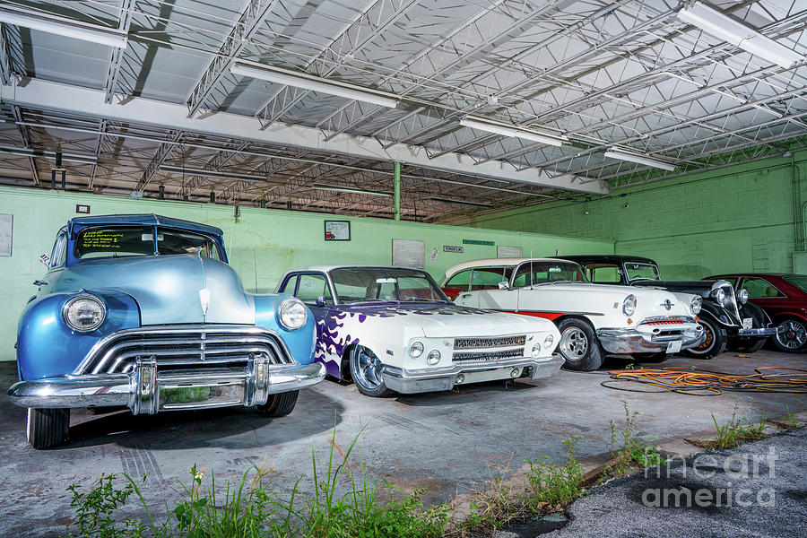 Photo of classic vintage cars in a garage Photograph by Felix