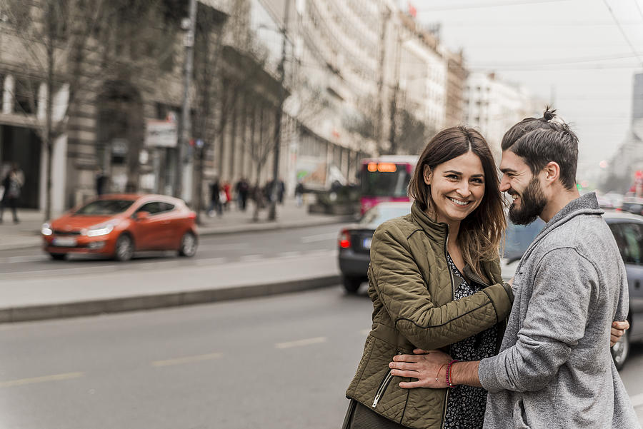 Photo of Happy Couple In A City Photograph by Ljubaphoto