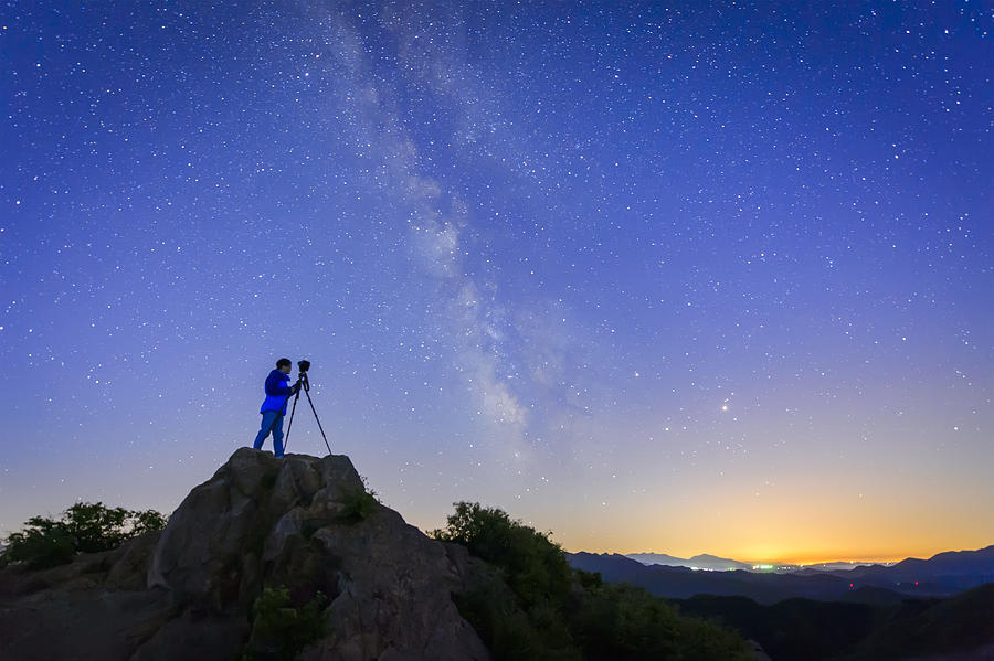 Photographer and the Universe Photograph by Bjdlzx