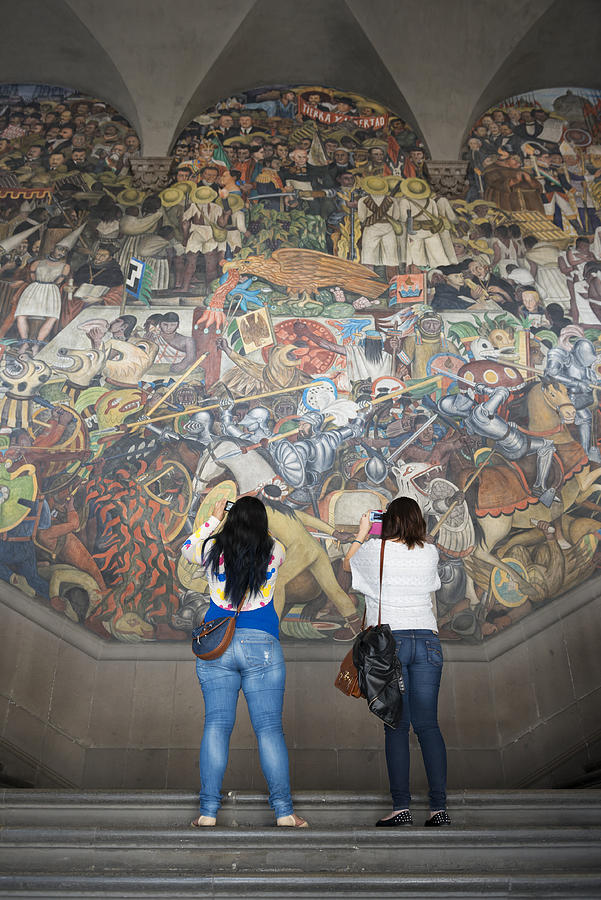 Photographing a Diego Rivera mural in Mexico City Photograph by Joel Carillet