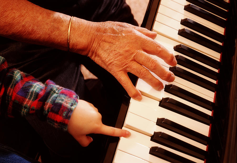 Piano lessons Photograph by Corbis/VCG