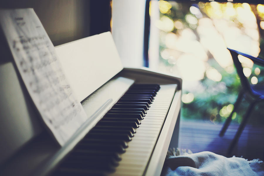 Piano with Balcony and Bokeh in the Background Photograph by Amanda Mabel Photography
