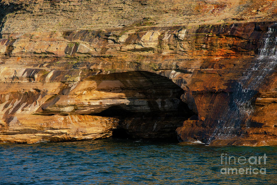 Pictured Rocks Sea Cave by the Falls Photograph by Bob Phillips