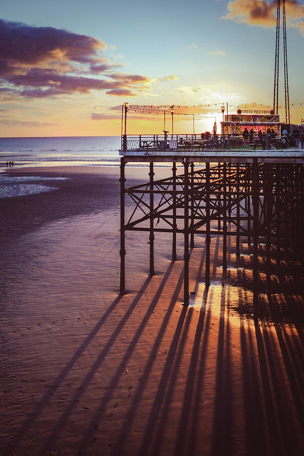 Pier at sunset Photograph by Nick Barkworth