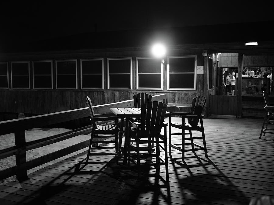 Pier Chairs At Night Photograph by Doug Ash