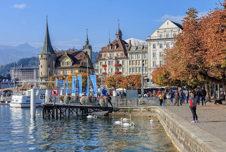 Pier on the Schweizerhofquai quay in Lucerne Photograph by Denis Linine