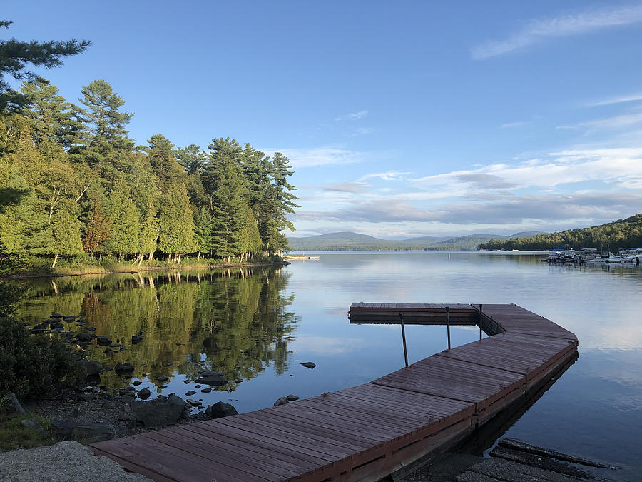 Pier or boat dock at lake Mooselookmeguntic in Rangeley, Maine USA Photograph by Cappi Thompson