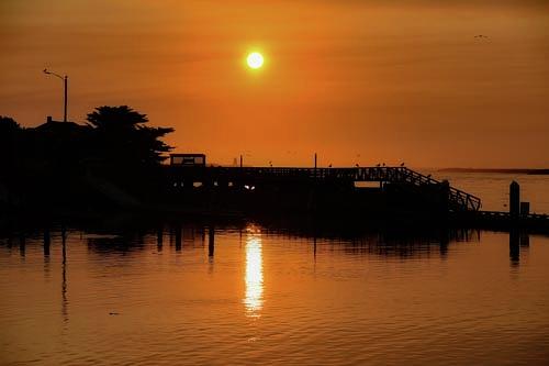 Pier Sunset Silhouette Reflection Photograph by Bonnie Colgan