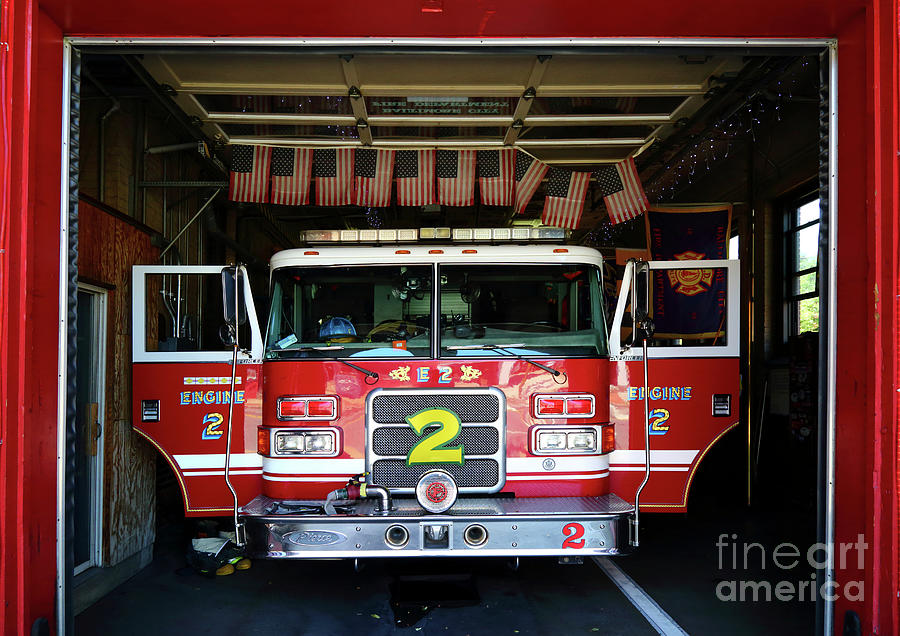 Pierce Enforcer fire truck in station Baltimore Photograph by James Brunker