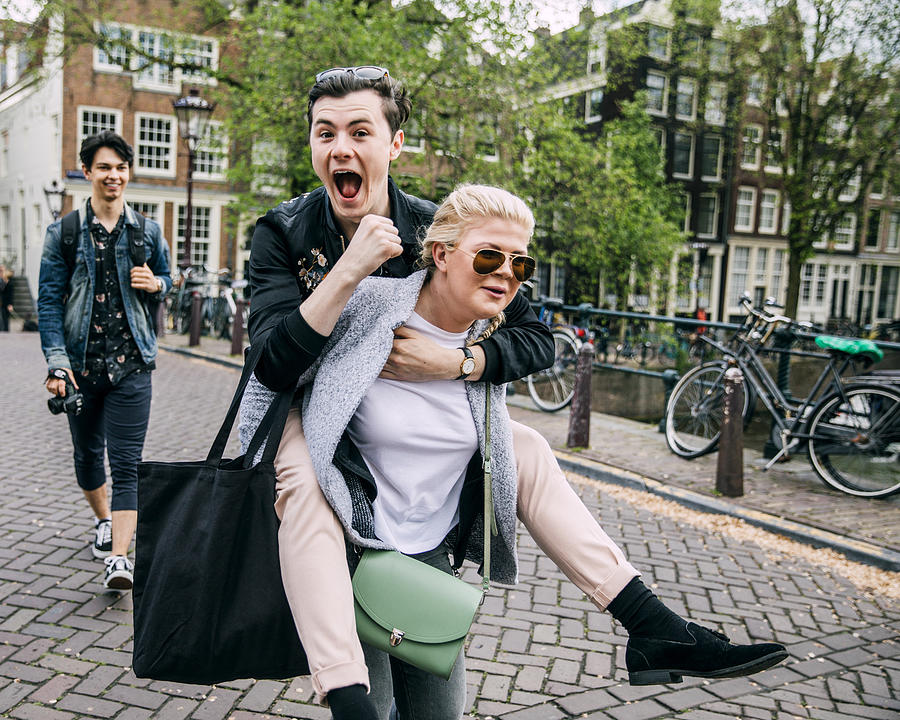 Piggyback In Amsterdam Photograph by SolStock