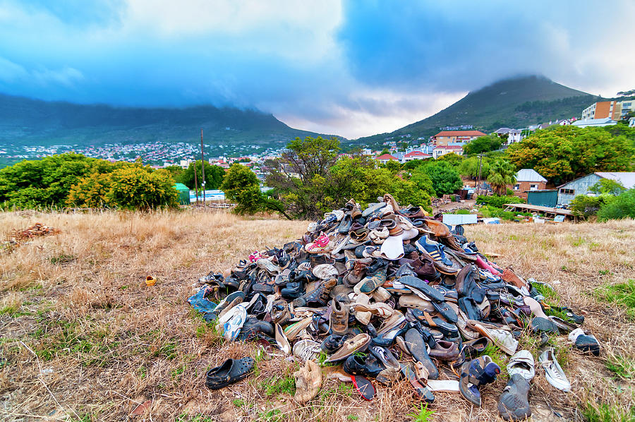 Pile of discarded shoes  Photograph by Fabrizio Troiani
