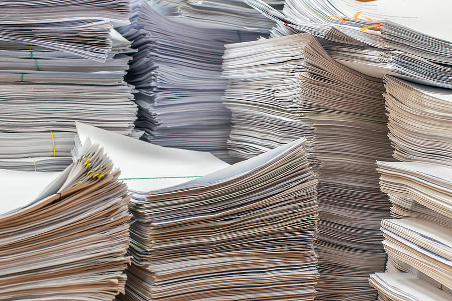 Pile Of Paper Documents In The Office Photograph by Artem Cherednik