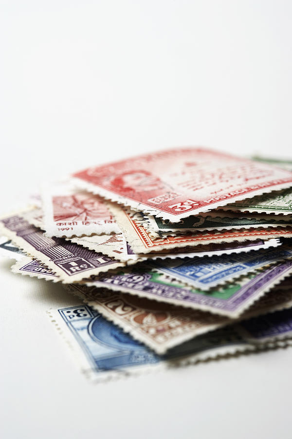 Pile of Postage Stamps Photograph by Moodboard